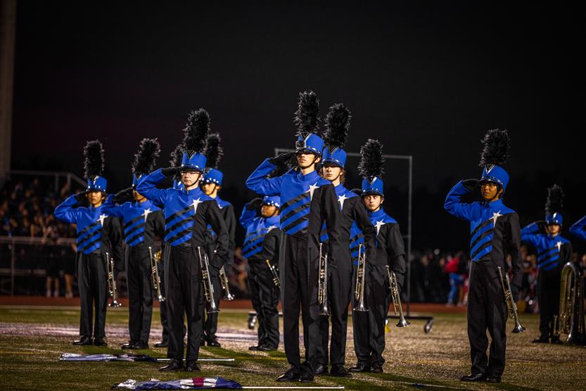 Students perform on football field